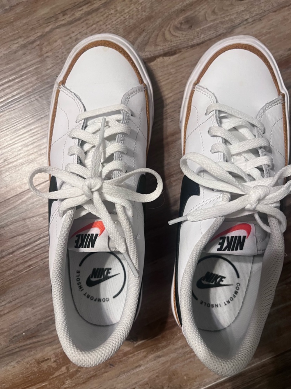 Nike White Sneakers with Black Swoosh and Brown Trim
